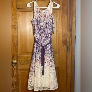 Pretty flowered dress. Never worn.